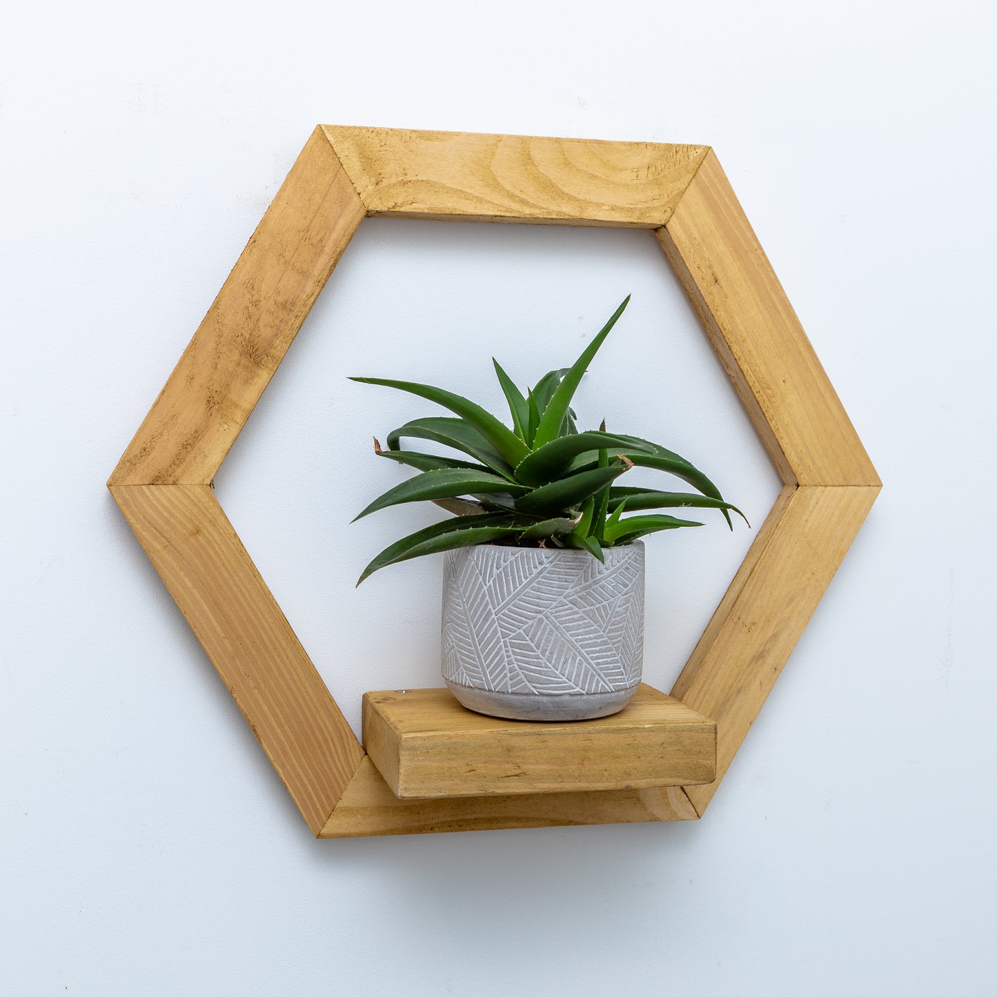 Handmade hexagonal rustic wooden flower shelf with natural finish, UK made.