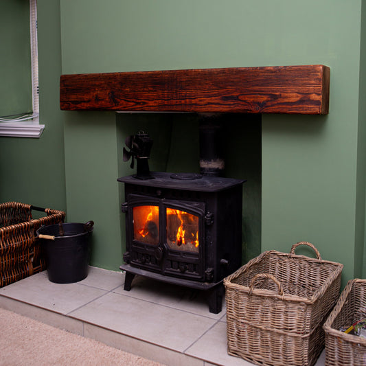 Handmade rustic wooden mantle piece with natural finish, made in the UK.