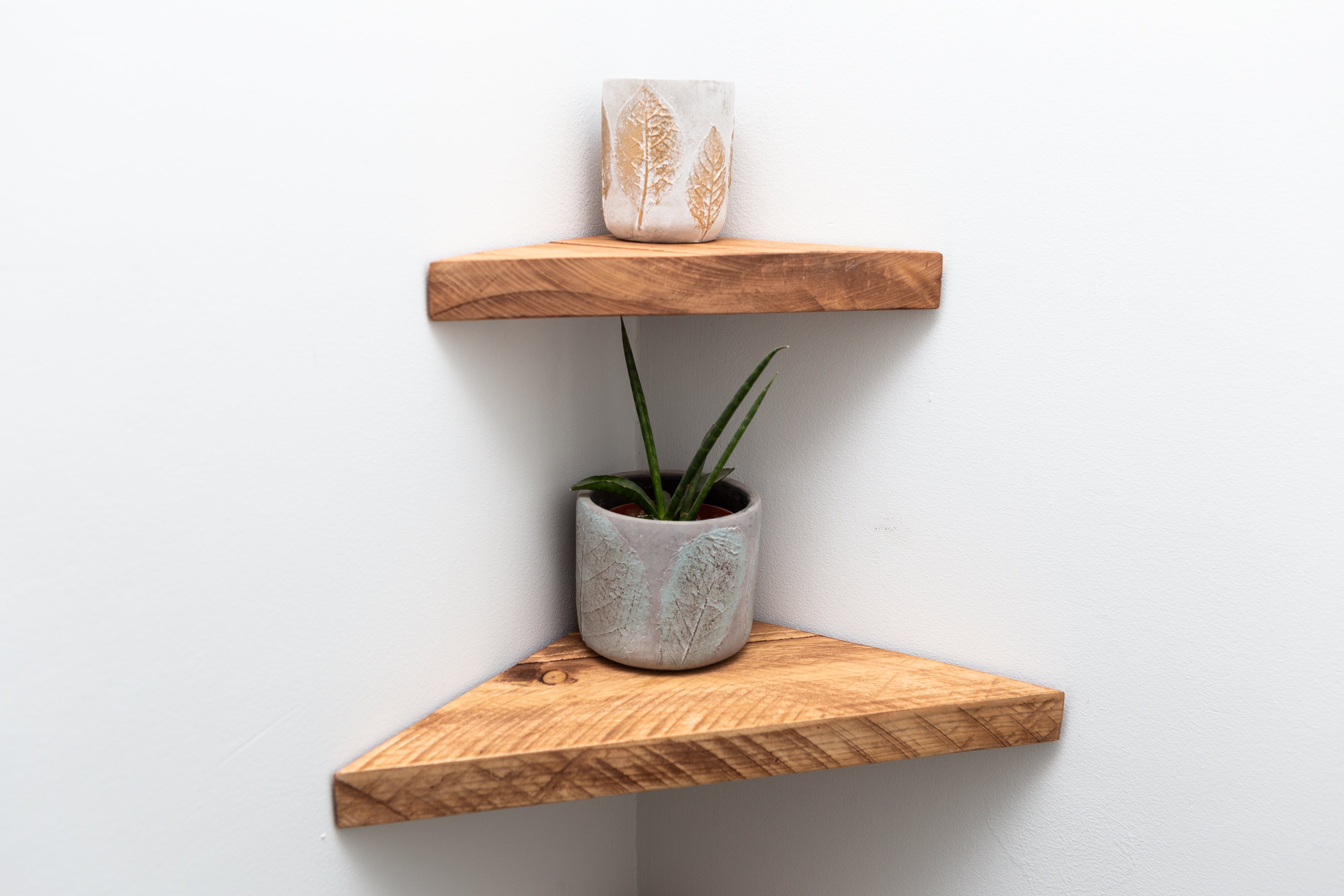 Small wooden shop corner shelf